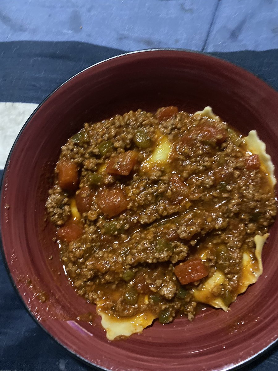 Homemade ravioli with a meat sauce w onions and peppers