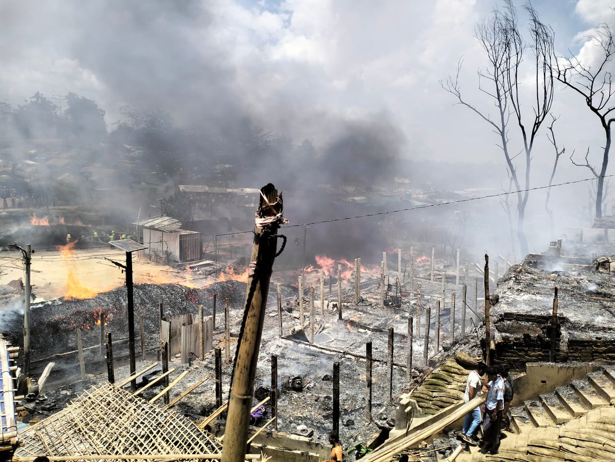 RohingyaNews's tweet photo. #BreakingNews

Today at around 12:00 pm, a group of RSO gangsters came with weapons at Camp-13 &amp; set fire . A large numbers of shelters have been burned down to ashes. Now,the fire under control. The casualties of the fire is still unknown. 
@AJEnglish 
@rsomedia 
@hrw 
@shafiur https://t.co/ak8x9ieKTB