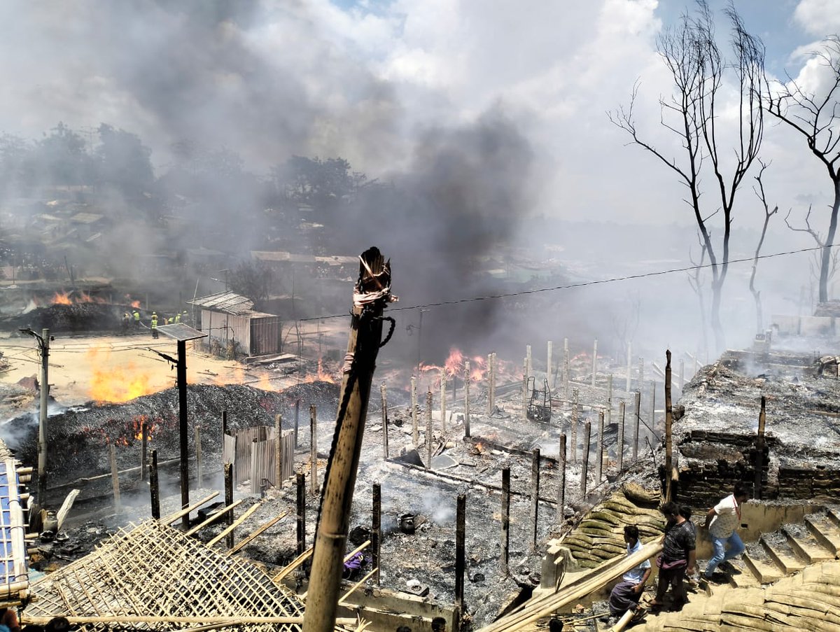 RohingyaNews's tweet photo. #BreakingNews

Today at around 12:00 pm, a group of RSO gangsters came with weapons at Camp-13 &amp; set fire . A large numbers of shelters have been burned down to ashes. Now,the fire under control. The casualties of the fire is still unknown. 
@AJEnglish 
@rsomedia 
@hrw 
@shafiur https://t.co/ak8x9ieKTB