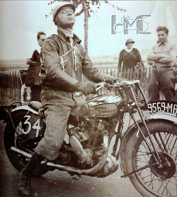 Maybe that’s how all the riders posed for the camera in the 1930’s Period photo of a Royal Enfield rider aboard his competition machine, additional protection can be seen mounted to the underside of the engine. The bike, thought to be one of the first Bullets, the 488cc Model LF