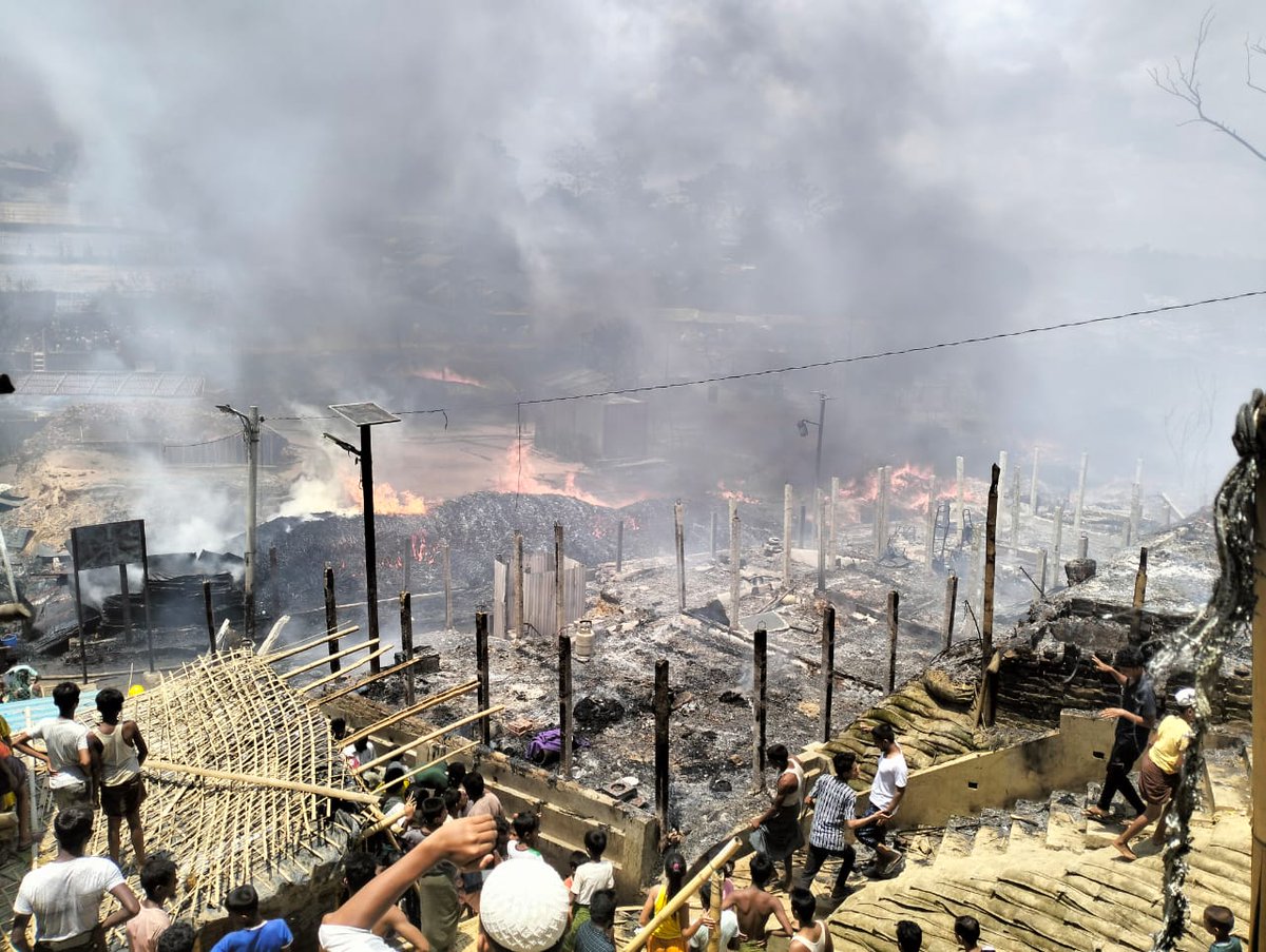 RoMashukh01's tweet photo. Deep Information:
©Rumor:
There was a quarrel yesterday between RSO and camp 13 block residents regarding recruiting of Ro youths. For that reason, some of the members of RSO(4-5) have come today and set fire to a shelter office(Caritas)
#NeedProtection #SaveRohingy https://t.co/oX4LtSJpgR