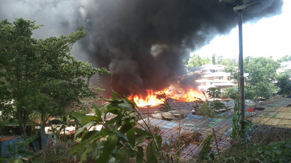 RoMashukh01's tweet photo. Deep Information:
©Rumor:
There was a quarrel yesterday between RSO and camp 13 block residents regarding recruiting of Ro youths. For that reason, some of the members of RSO(4-5) have come today and set fire to a shelter office(Caritas)
#NeedProtection #SaveRohingy https://t.co/oX4LtSJpgR
