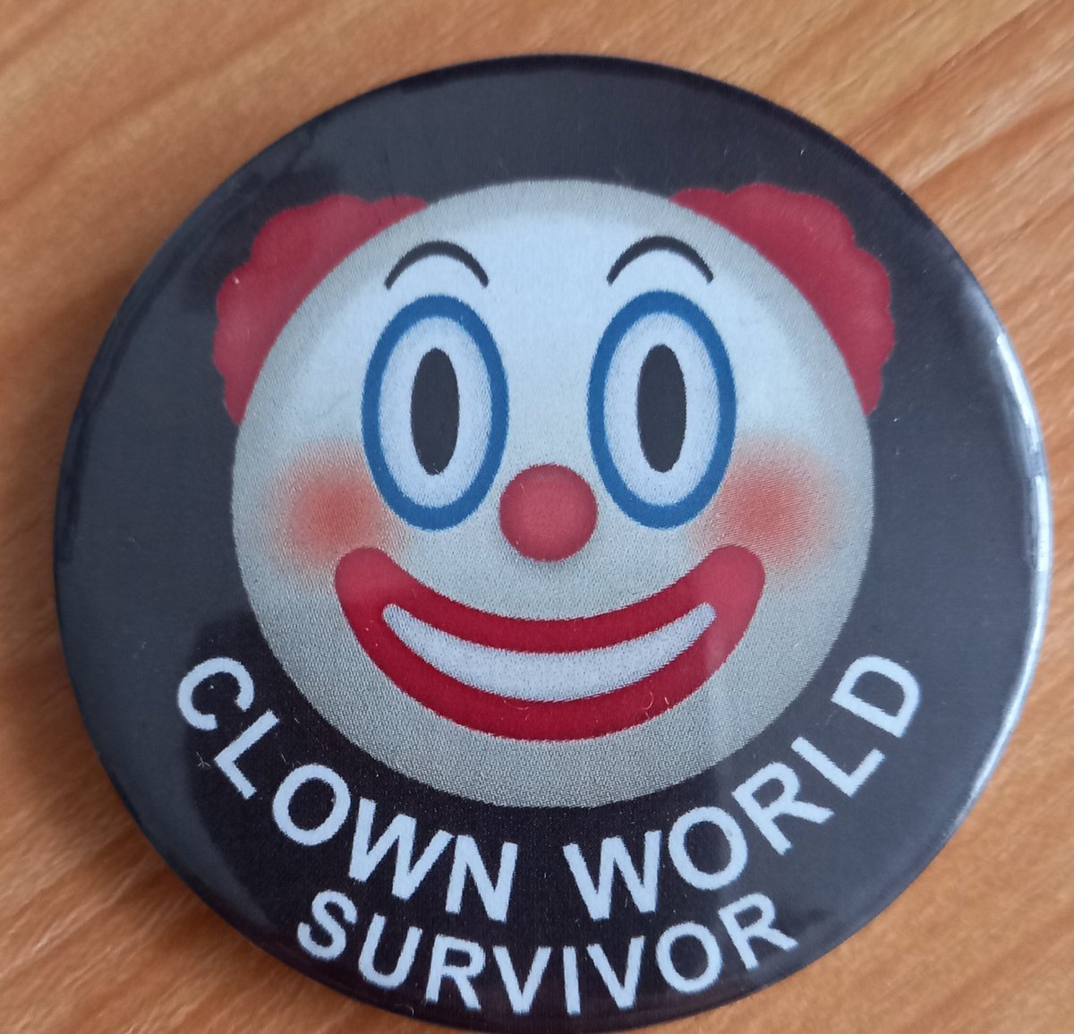 Surviving so far. Got the badge to prove it. How about you? 🤡
