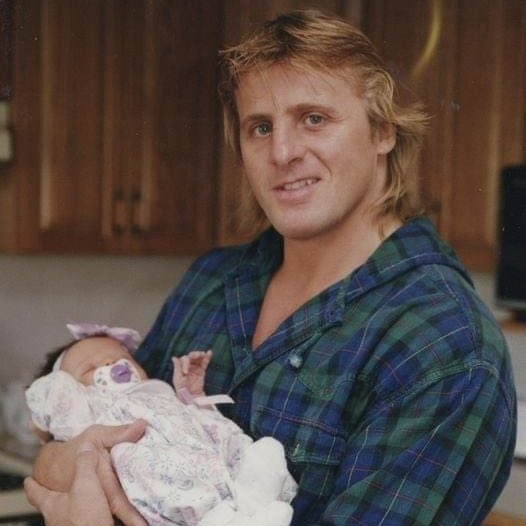 steven_bellah's tweet photo. 25 years ago tonight I sat in KC’s Kemper Arena and watched in horror as Owen Hart accidentally fell to his death from the ceiling during a WWF PPV. They didn’t stop the show. Not even the police, to preserve a death potential crime scene. He was just 34 years old. https://t.co/8SNv4RGdLw