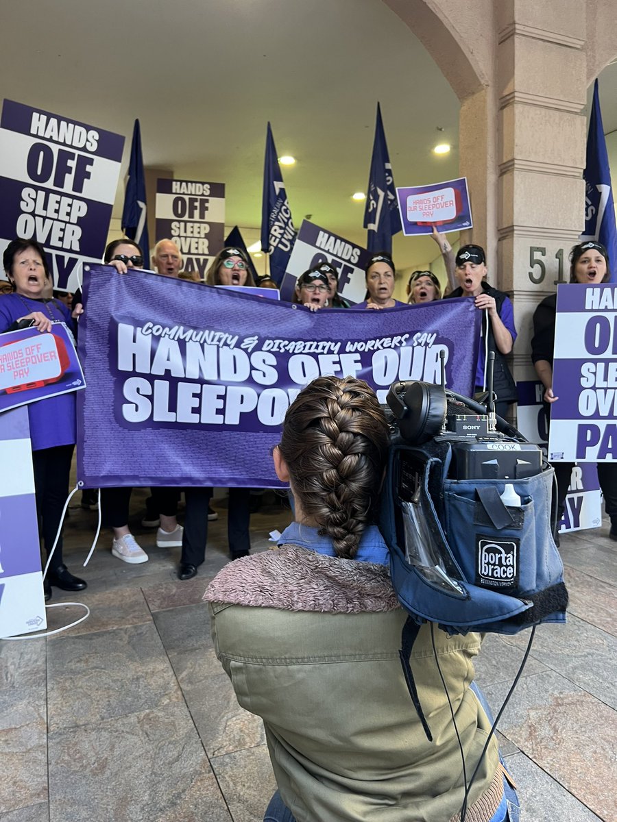asu_nsw_act's tweet photo. Big business is trying to cut pay for community workers who work sleepover shifts.

Workers already spend 8 hours at work for only $55 - and big business want to cut their pay even further.

ASU members today protested outside the North Sydney offices of lobby group @The_AiGroup https://t.co/iCNHHj4lYR