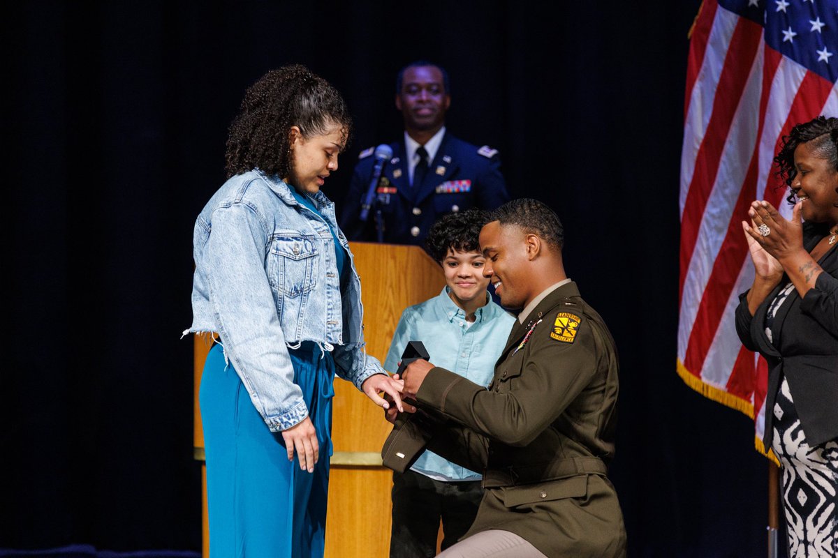 PresBreaux's tweet photo. A first for our @BowieState ROTC Commissioning Ceremony, an on stage wedding proposal by newly commissioned Lt. Matthew Williams as our special guest ret. LT General R. Scott Dingle looks on. Congratulations to the happy couple and family from your BSU family!! https://t.co/wnYnP7V50H