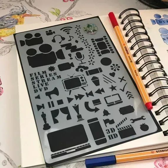 This #Journal Stencil is great for recording the #Film & #TV you've watched or want to watch. It's great if you are like me, terrible at remembering what you would like to see or have seen, for #BuJo Layouts or adding Artistic flares 📖 Available at: buff.ly/3pLbtcn 📽️