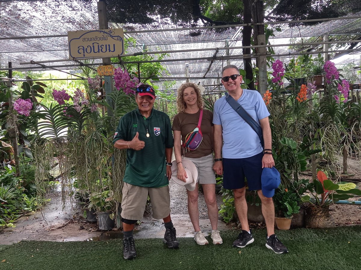 A New Yorker couple and I, at Uncle Niyom Orchid Farm Ladmayom Canal : Talingchan Bangkok, Thailand