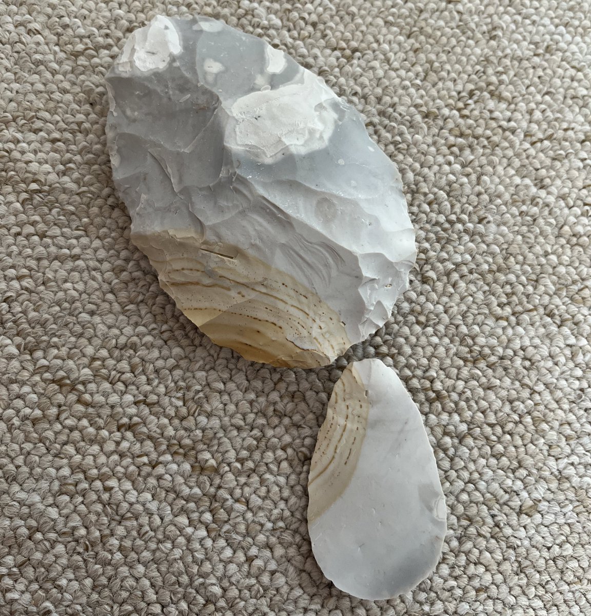 I bought this handaxe and scraper from @ancientcraftUK many moons ago, trying to cheer myself up mid-pandemic… and I’ve finally got them out to put on display! Aren’t they beautiful? The scraper flake came from the handaxe production. Look at the iron staining 😍 #FlintFriday