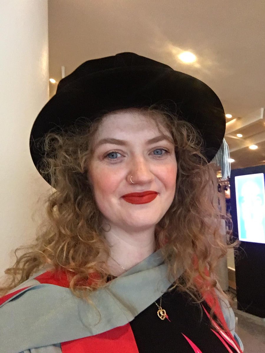 I really like this photo from my graduation ceremony the other day. Anyway that makes 3/3 graduations in which I could not keep the gown from slipping off my shoulders.