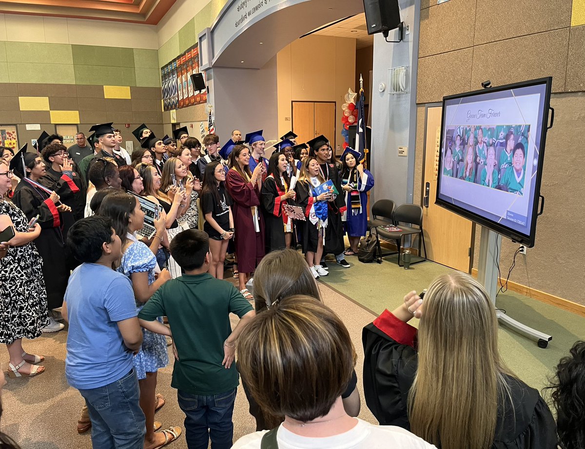 Seniors and families watching their elementary slideshow!