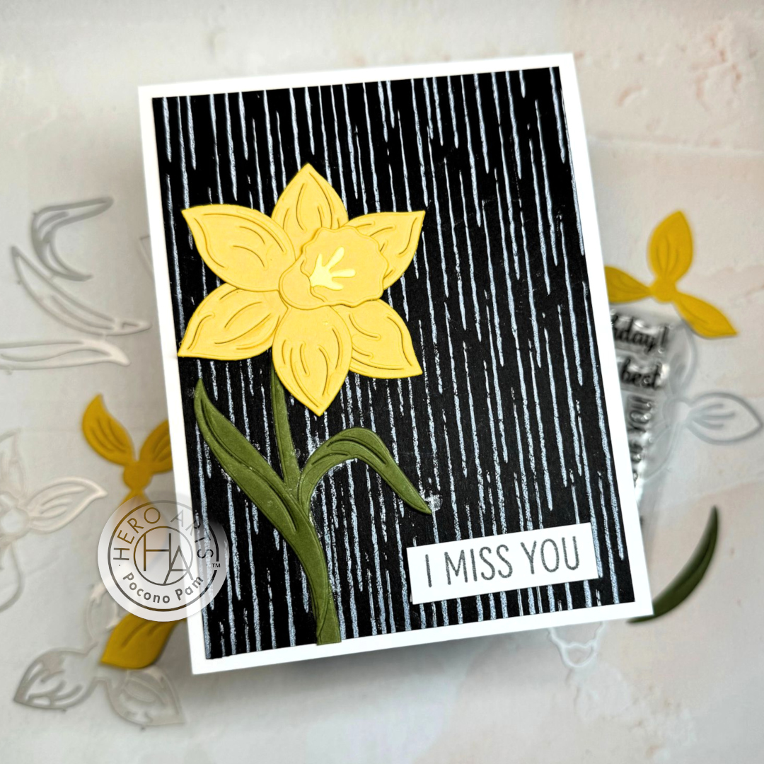 Dreamy daffodils on display! 💛 Join Pocono Pam over on the blog to learn how she created this beautiful card with our Daffodil Fancy Dies and Rain Texture Bold Prints background stamp: heroarts.com/blogs/hero-art…
