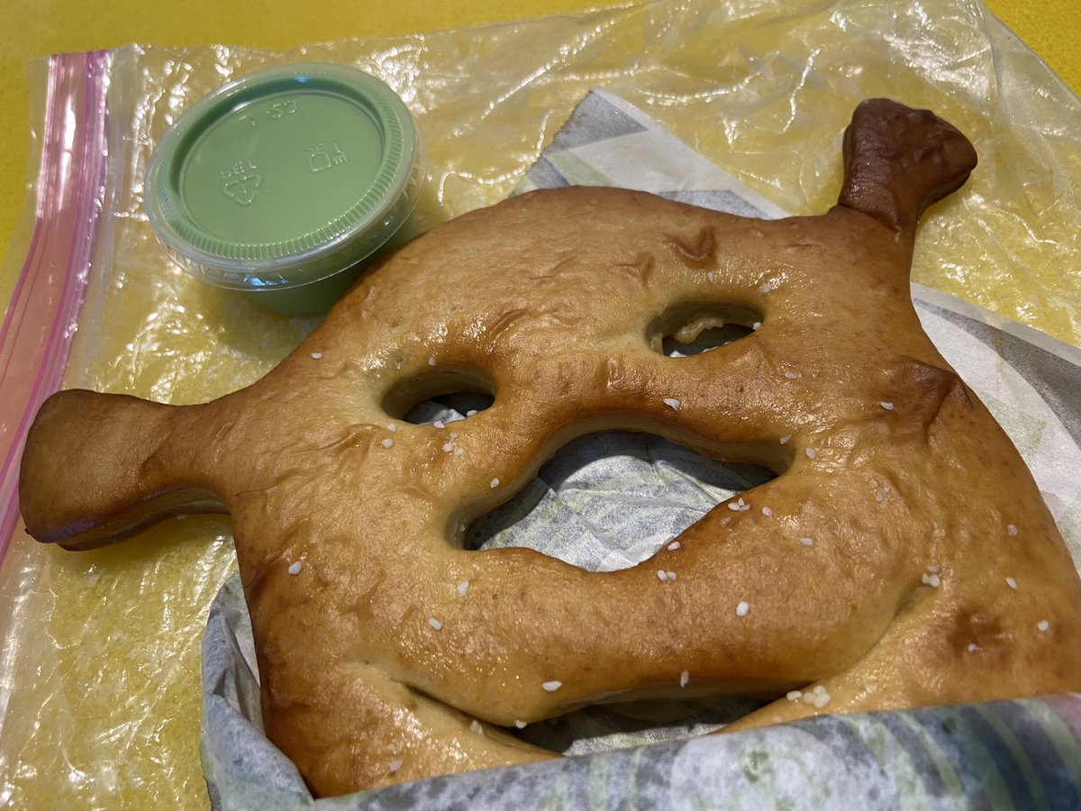 Finally got my Shrek pretzel w/ green booger cheese. #UniversalOrlando