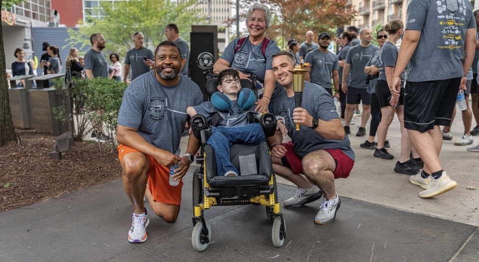 Members from the Winston-Salem PD and Forsyth Co. Sheriff's Office gathered in Bailey Park for the Law Enforcement Torch Run fundraiser for the NC Special Olympics. The torch, or the 'Flame of Hope' symbolizes courage and the celebration of diversity.