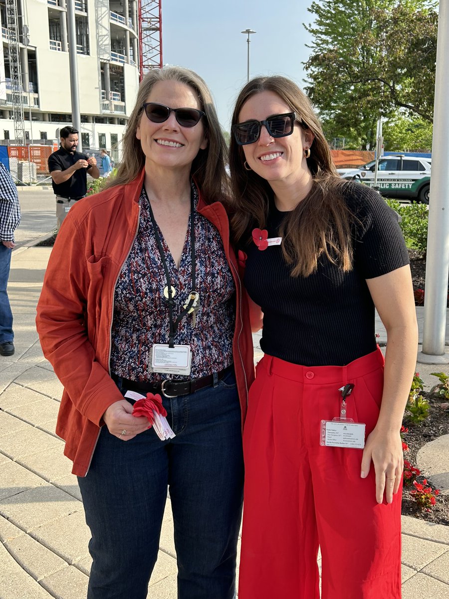 MedicalCollege's tweet photo. In observance of #MemorialDay, MCW held a Taps event in front of the Health Research Center this morning to honor the sacrifices of those that served our country. MCW President and CEO Dr. John Raymond gave a speech to commemorate the day, and poppies were given out in remembrance of the fallen.