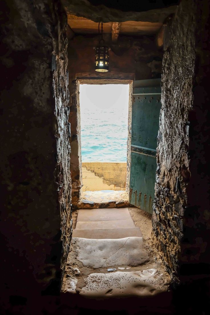 You are looking at the D00R OF N0 RETURN in Goree island, Dakar, Senegal, West Africa. Many Africans walked through this door on chains on their way to the antebellum of the Americas to be enslaved 400years ago. 0nce they walked through this door, never would you see your