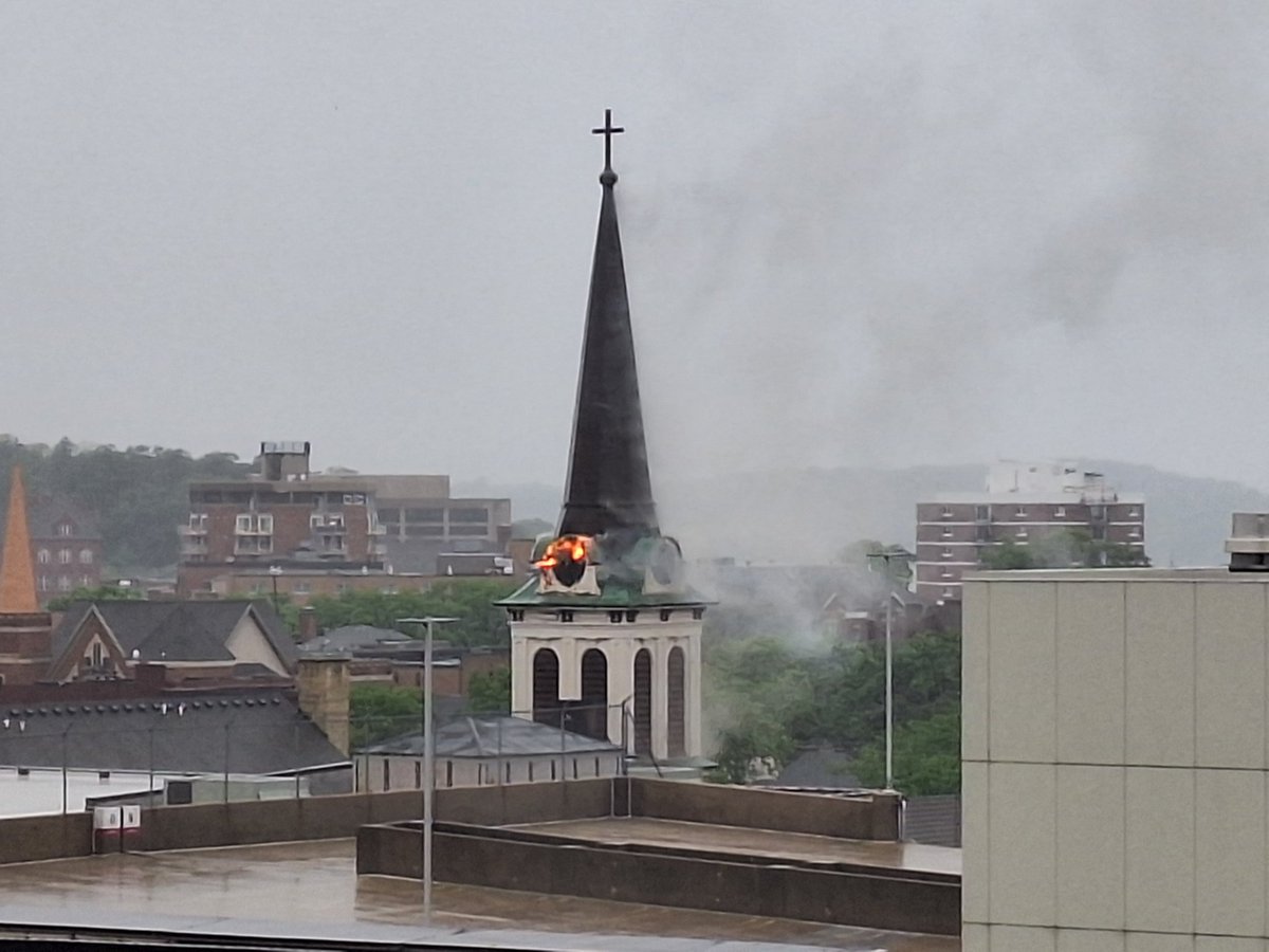 crowsaregoats's tweet photo. Well this just happened. Holy Redeemer Catholic Church - Saint Raphael Cathedral Parish caught on fire (Madison, WI) possible lightning strike. @WiStateJournal https://t.co/clOmhpnty8
