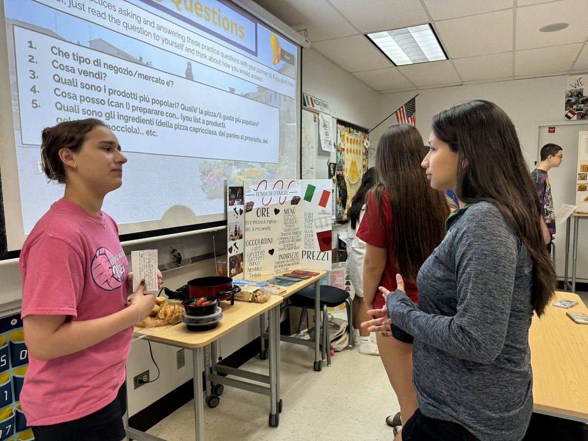 katiegweston's tweet photo. Freshmen Knights in Cultural Studies and Italian 1 presenting their research this morning! From Italian food stalls to folk cultures around the world, what an impressive student showcase and P2P learning experience for all✨ #PBL @KnightsofPHS https://t.co/dqrflLfUDy