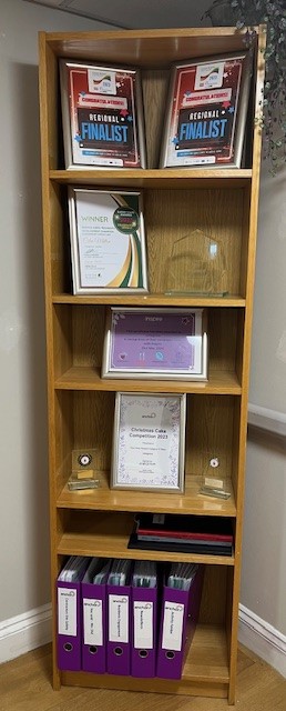 Our new display area in reception proudly displaying are staff and residents achievements with our awards and trophy's. #CareHome #easthorsley #surreycareawards #britishcareawards #InspireAwards #christmascake #winners 2 years in a row @AnchorLaterLife