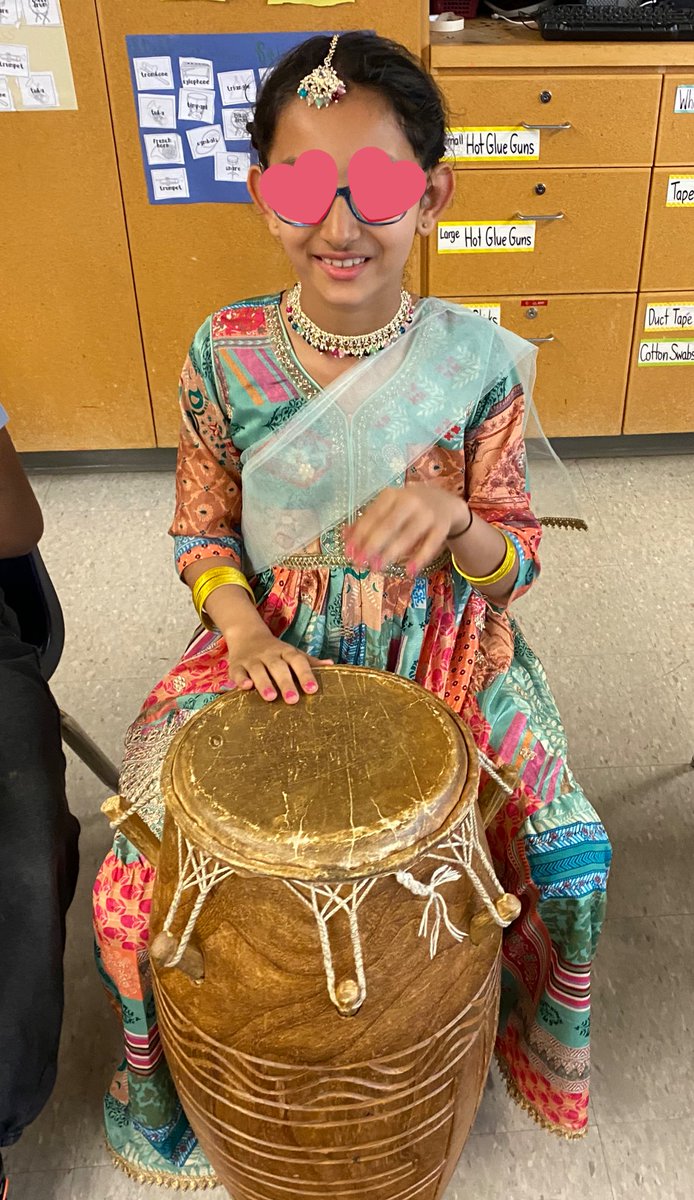 This is Canada. This is Ontario. This is Toronto. This is the @tdsb. This is @BeaumondeBHJMS. Where a Grade 3 student, just finished performing a dance at our afternoon Asian Heritage Assembly, joins her classmates already engaged in a Ghanaian drumming session. 🤩🎶🪘@TDSB_Arts
