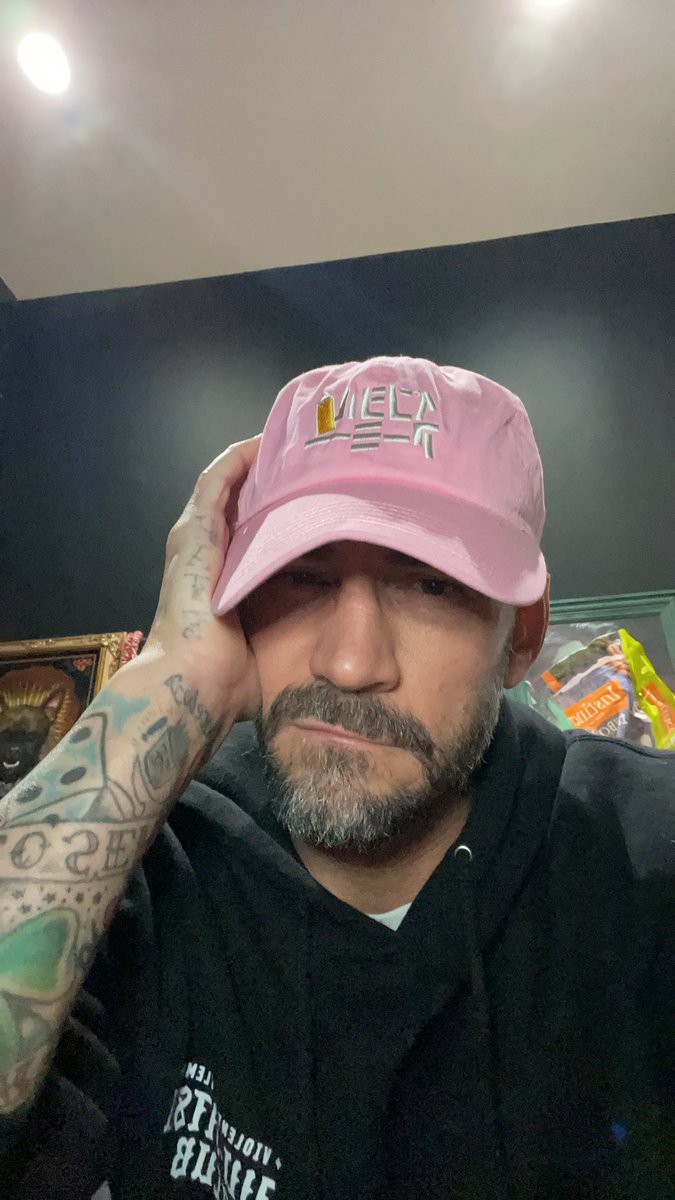 CM Punk and Lulu Pencil, Punk wearing the Pencil Army hat. #CMPunk #LuluPencil #PencilArmy #prowrestling