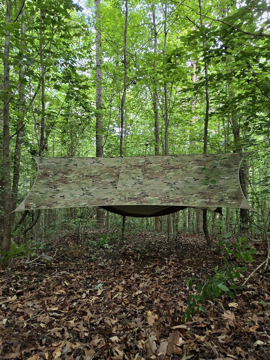 Here in GA training with the @fiddlebackforge crew. Home for the weekend hillside and in the trees. @Lite_Fighter Recondo Hammock is my go to hot weather/tropic shelter option. #Georgia #camo #camp #bushcraft