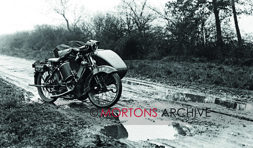 From our archive: A 1940 Scott outfit. Potholes and rain? #classicbikeshows #motorcycle #motorbike #motorcyclelife #classicmotorcycle #classicbike #motorcycleclub #classicmotorcycles #motorbikelife #classicbikes #motorcycleevent