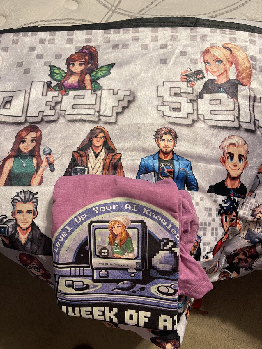 My winnings from #WeekofAI have been delivered! @AmandaFoxSTEM not only sent me a shirt but she added a Blanket, which was immediately scooped up by Mr. Charlie! An amazing way to remember an amazing week! Thank you Amanda!!!!!