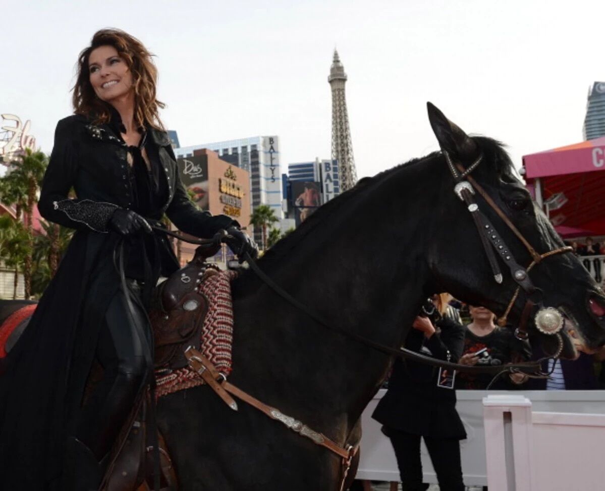 Twelve years ago, Shania Twain showed up at Caesars Palace on horseback. It's part of a commercial shoot touting her upcoming Vegas residency. #MusicIsLife