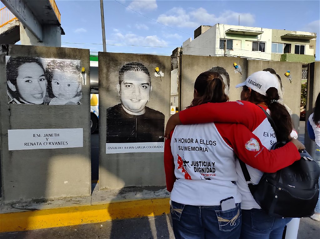 For this #PhotoFridays, we highlight the work of the @USAID Human Rights Accountability Activity (RED-DH). In this photo, Oscar Pimentel Cortes captures two women embracing in front of a visual tribute set to raise public awareness about the scale of disappearances in Mexico.