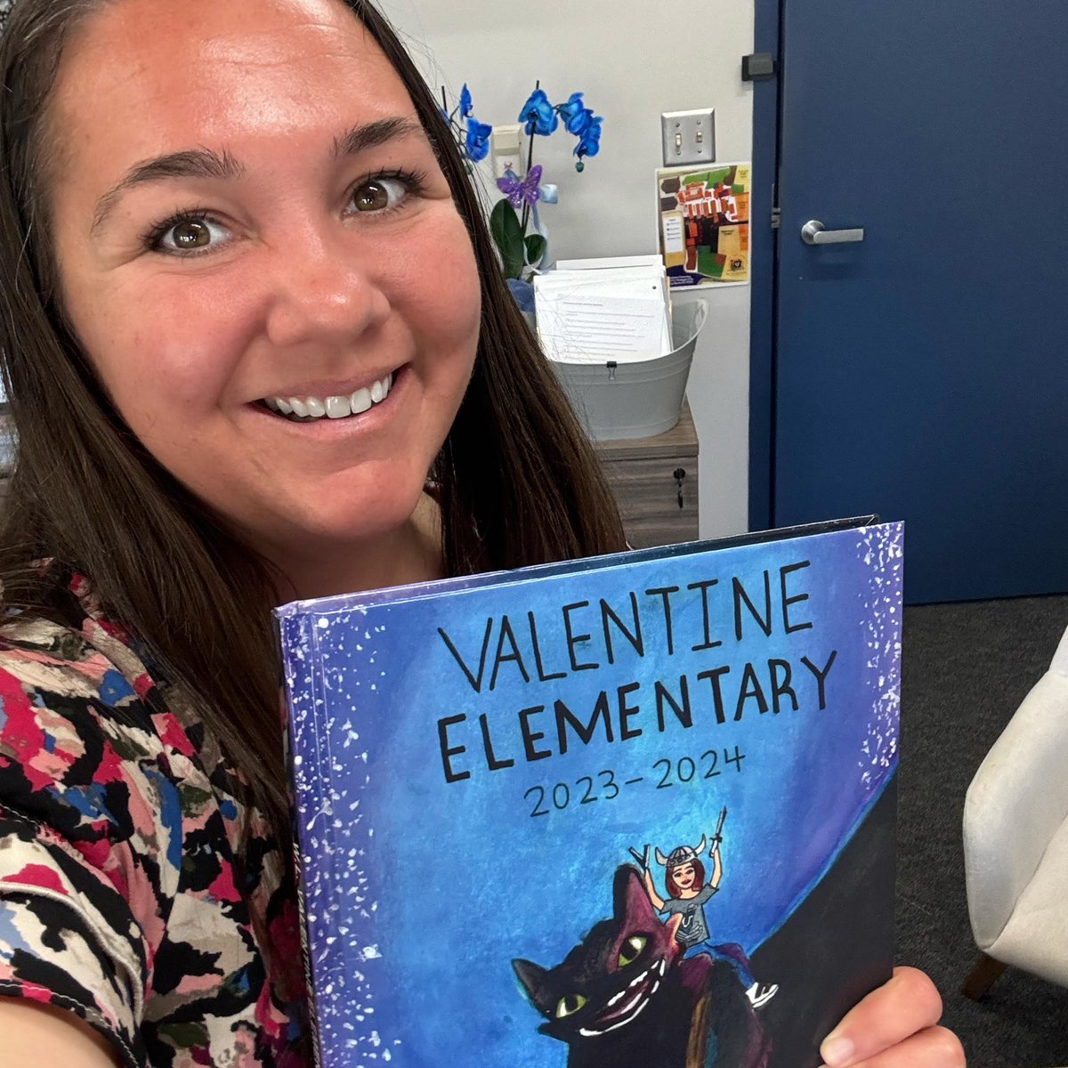 2024 Valentine 5th Grade Vikings Yearbook Contest participants and winner Hailey Chau being celebrated by Principal McAlpine for their outstanding creativity and art work for this year's yearbook.