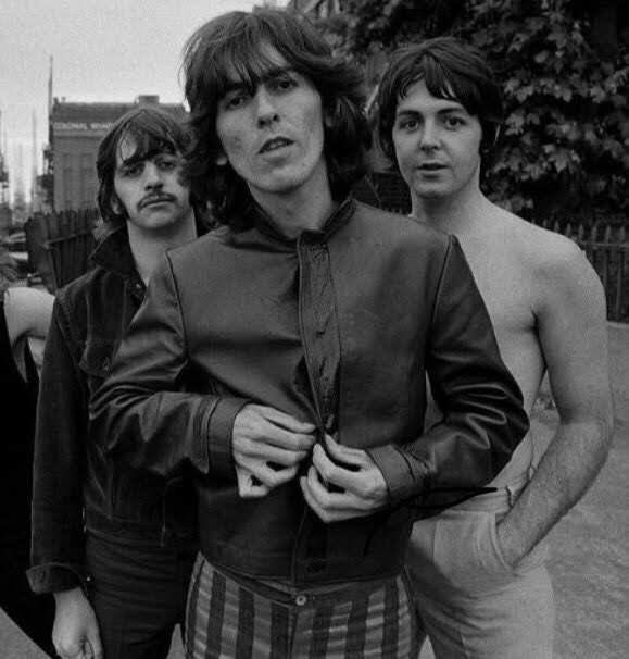 george looks like he’s about to tell the waiter that paul and ringo asked for no pickles