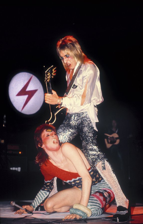 David Bowie and guitarist Mick Ronson on stage at the Empire Theatre, 1973