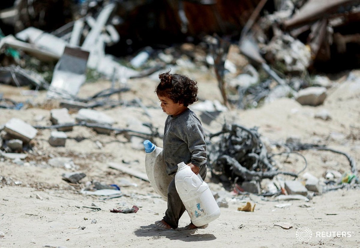 This small Palestinian child wanders alone in the ruins of her country, her family likely murdered by #IsraelTerrorists. @AlboMP, how long will you defend the indefensible?