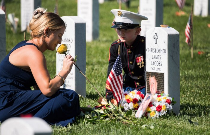 'Our fallen heroes have not only written our history, they have shaped our destiny. They inspired their communities and uplifted their country and provided the best example of courage, virtue and valor the world will ever know. They fought and bled and died so that America would