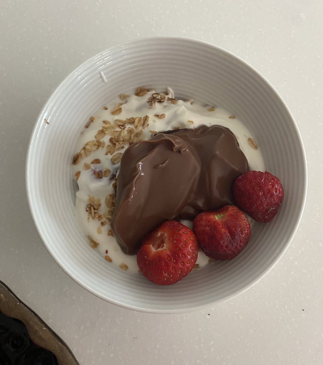 white yoghurt with müsli, chocolate protein pudding and strawberries <3