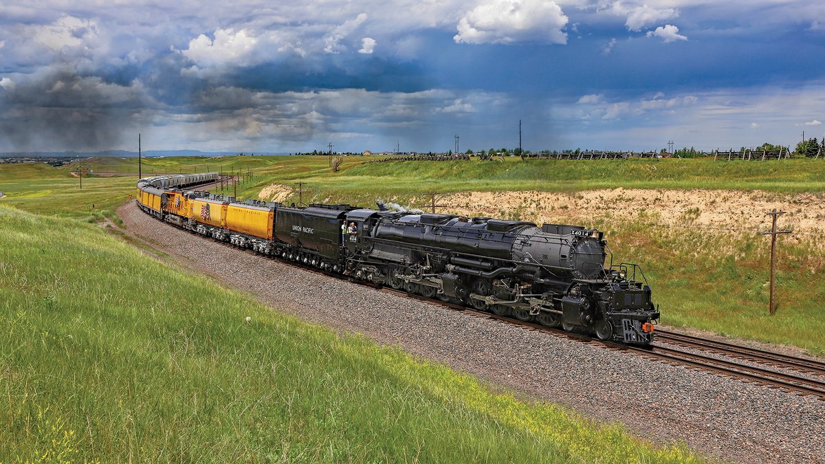 UnionPacific's tweet photo. Turn the page in your Union Pacific calendar to signify a new month. It's fitting that June's photo is of Big Boy No. 4014, as this month the steam locomotive will begin our Westward Bound tour.

This photo was taken by Ryan Slaton in Archer, Wyoming. https://t.co/OF6Nw2jCrO
