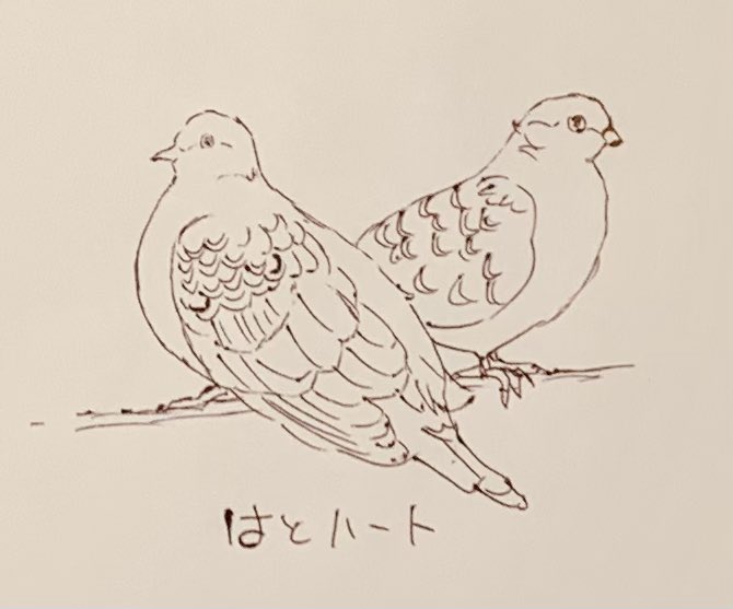 鳩が2匹ハート型にとまっていて可愛かったやつ、なんかの紋章っぽい 