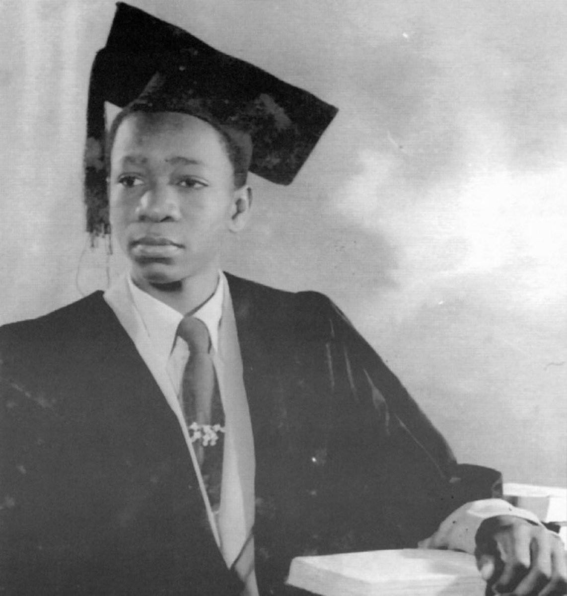 This is Wole Soyinka when he graduated from University College Ibadan. Your father was probably not born by then or was busy dancing naked in the rain but you are on social media insulting him today because he has different political opinion from yours. You are a goat 🫵