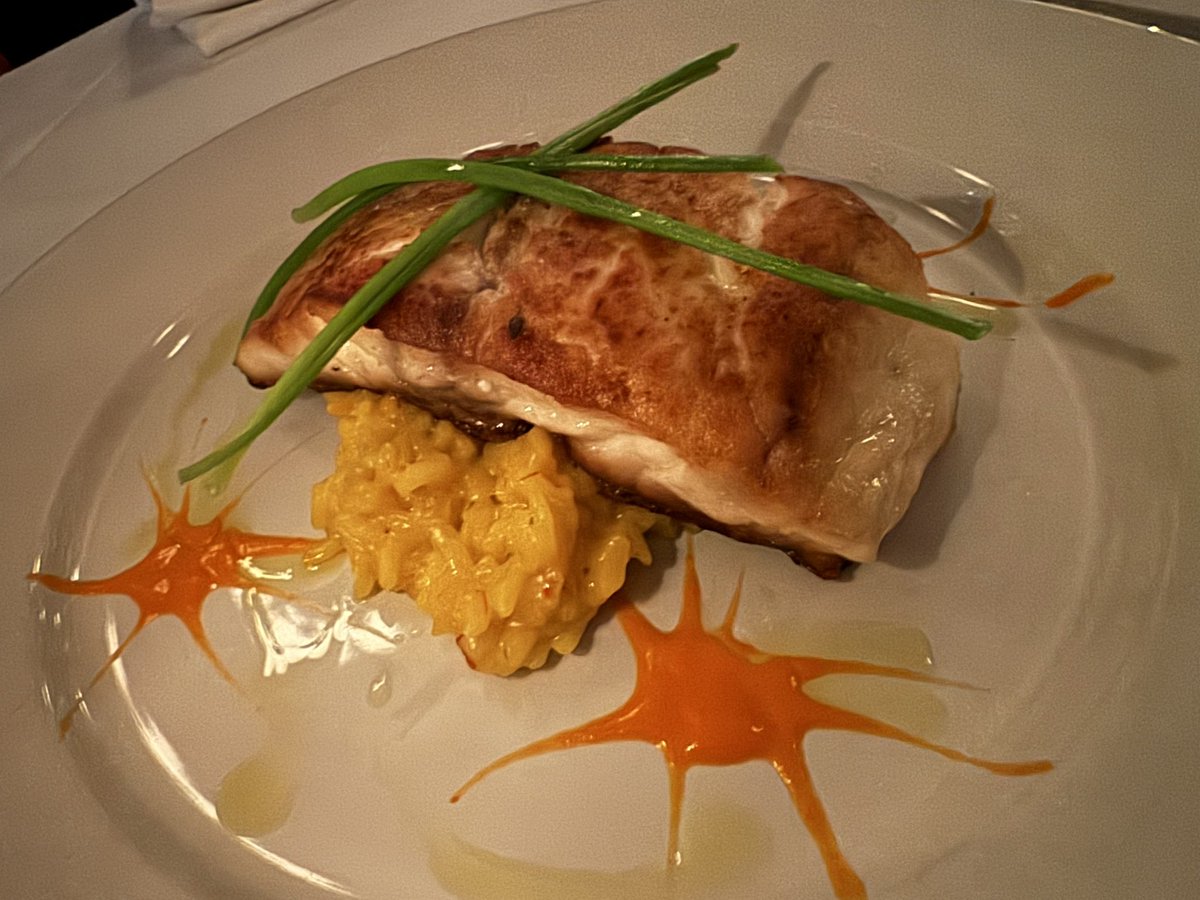 Weekend fish special! Pan-seared wild striped bass on a bed of saffron risotto with artful splotches of red pepper coulis. Bon appetit! 🍽️ #mannysbistro #wildstripedbass #stripedbass #fish #poisson #saffron #bonappetit #nyc #newyork #newyorkcity #pescatarian #pescatarianlife #uws