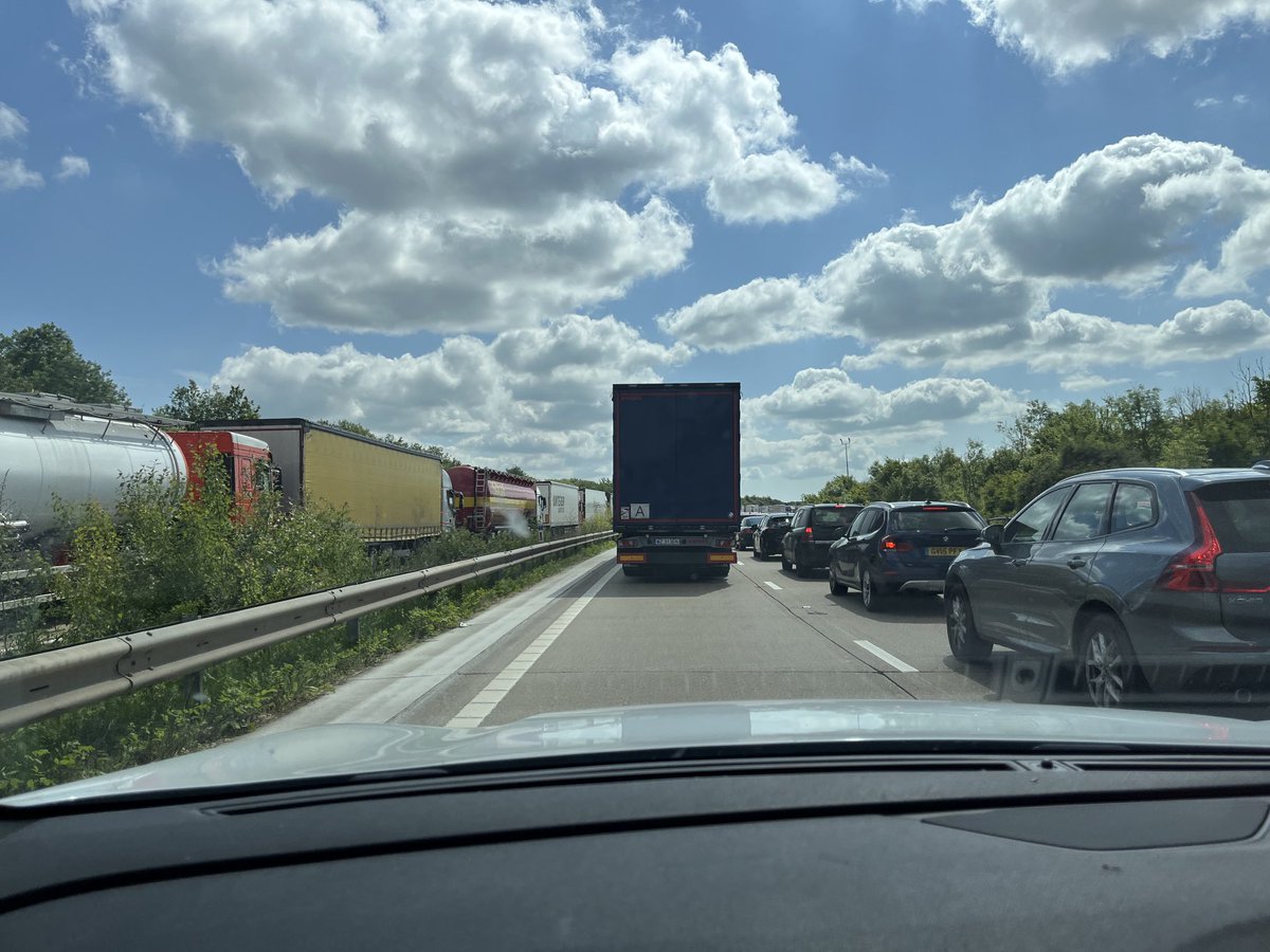 A true @michaelgove legacy: driving down to Kent coast past at least 5 miles of parked lorries on M20, still 5 miles to Ashford.