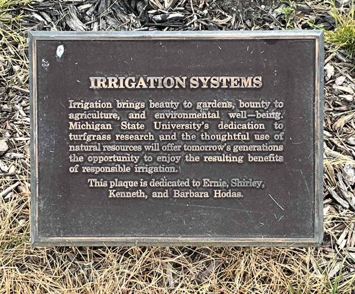 rabemich's tweet photo. Ran into this plaque in the horticulture gardens outside PSM building. Ernie Hodas was elected to the Board of Directors of The (US) Irrigation Association in 1977. He was the President of ag and turf irrigation supplier Century Supply Corporation of Berkley, MI. https://t.co/jPxokqLyDA