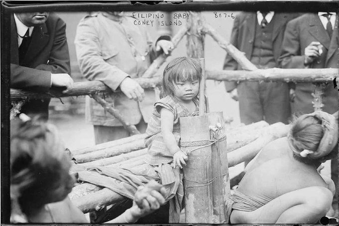 A Filipino baby and her family inside a human zoo in New York (Coney Island), US, 1906. Human zoos were once very common in the Western world.