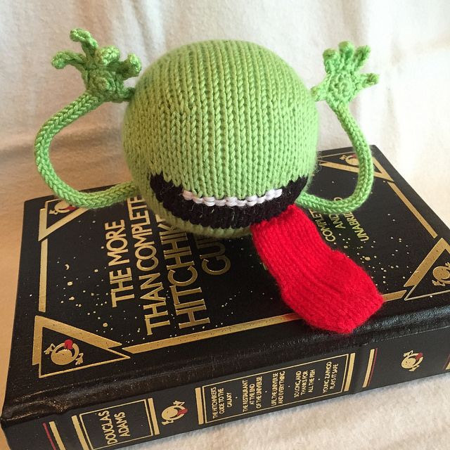 Don't Panic! It's Just Carissa Browning's 'Cosmic Cutie' From The HitchHiker's Guide To The Galaxy. Make one: 👉 buff.ly/2XqF0q2 #knitting #towelday #dontpanic #hhgttg #douglasadams