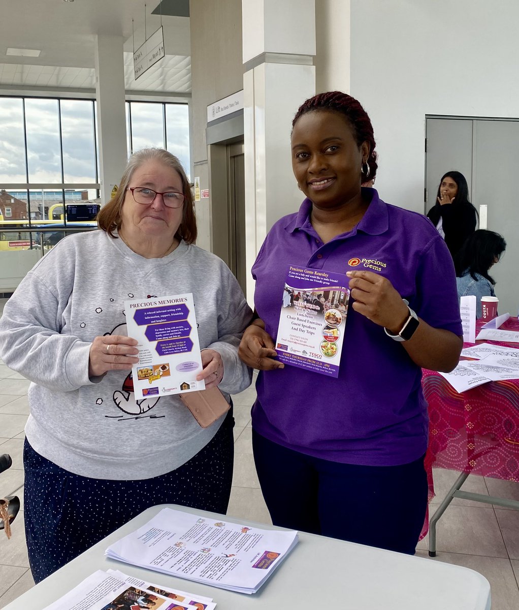 At Bolton Bus Station Spring Fair talking to people about the work Precious Gems does in the community
