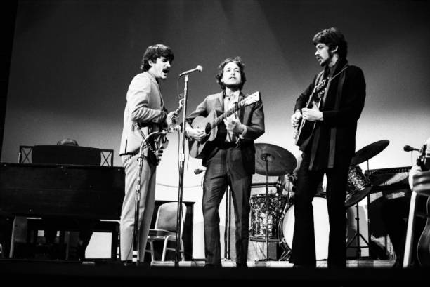 Happy #DankoDylan Saturday Rick, Bob Dylan and Robbie Robertson at the Woody Guthrie Memorial Concert, in January 1968. It was before The Band had a name, and they were billed as The Crackers. Photo by David Gahr