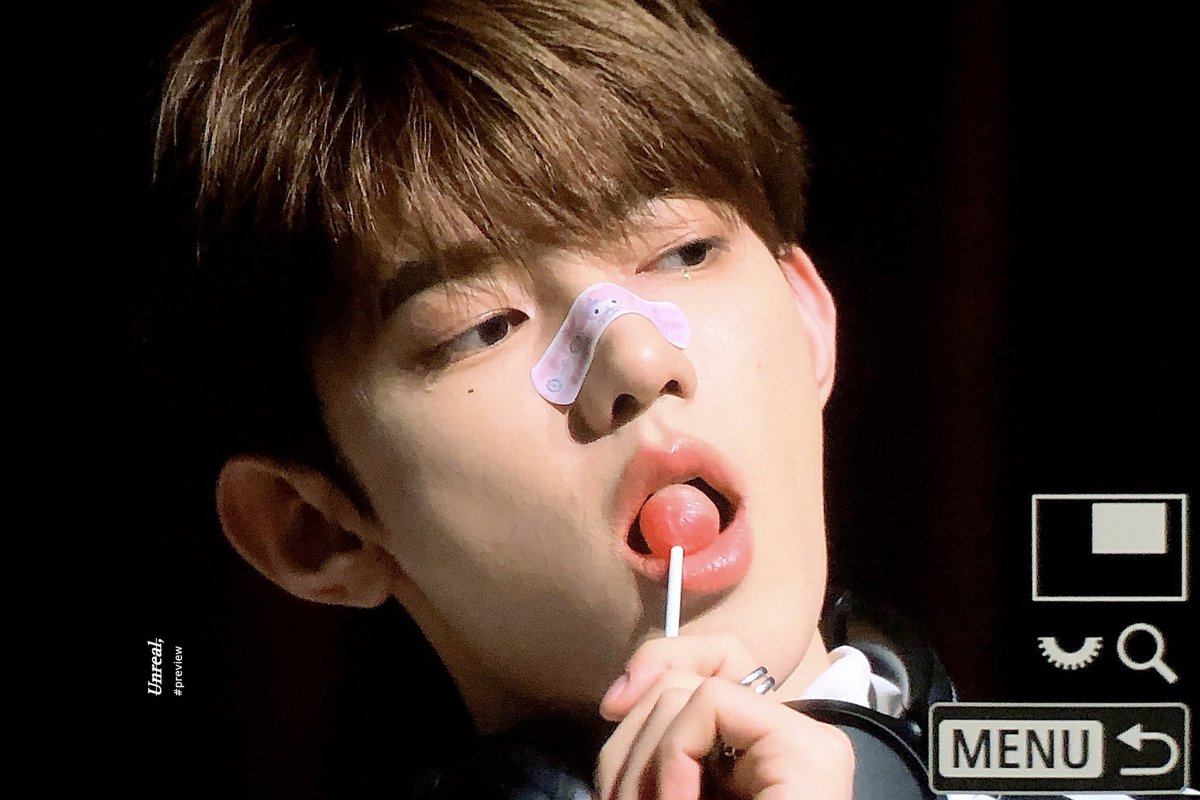 licking & blowing that candycane while looking at the camera is h e insane i cant do THIS