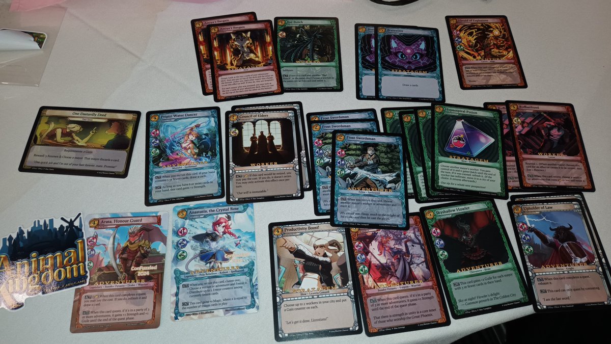 Ever700's tweet photo. @AnimalTcg @cfconvention some amazing pulls from the mini packs IDK if I got something rare but they are so pretty!!! https://t.co/rT6YF3X46Q