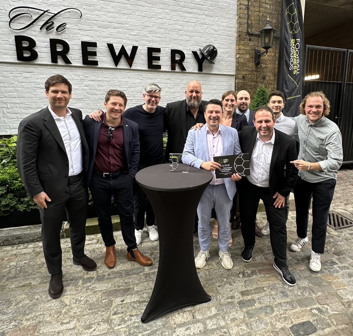 HrsticIvo's tweet photo. Football Business Awards: Silver-Trophy for „Goal Arena“ ✌️ It’s a honor and motivation to do it even better 24/25. Thanks to a great team and all the #Bundesliga fans out there 🙏 @RaeComm @kevinhatchard @robtdaly @turnerrob1 @Bundesliga_Phil @danohagan @RealOwo @SteffenFreund https://t.co/Q7Ya9EEImq
