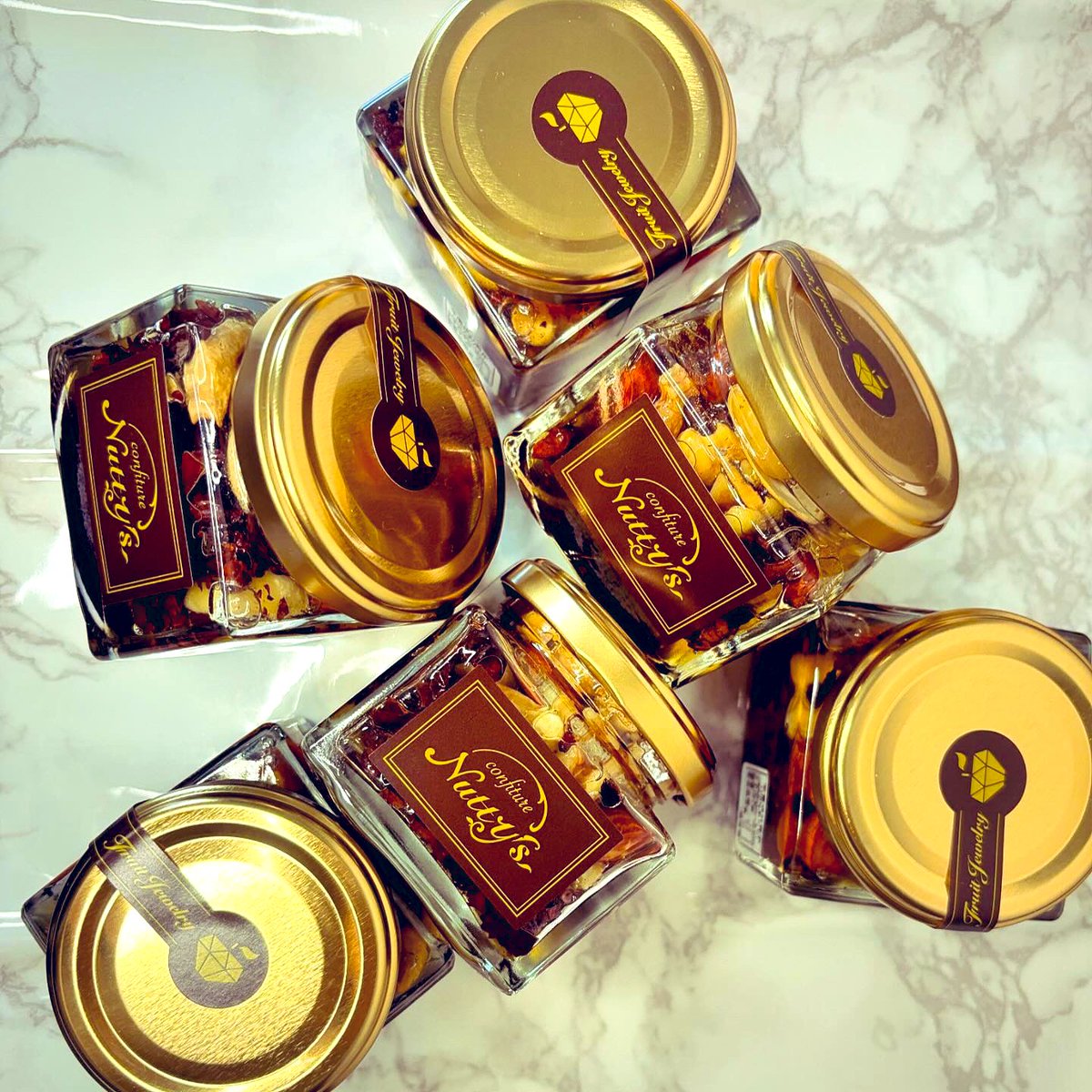 confit_nuttys's tweet photo. ［京都コンフィチュール専門店
confiture Nutty's］
　『カカオ×ミックスナッツハニーコンフィチュール』
カカオとNutty'sオリジナルハニーとナッツたちの極上のハーモニー
　
#jam #ジャム #ナッティーズ 
#父の日
#コンフィチュール   #スプーン一杯が運ぶひと時の幸せ 　#京都みやげ   #��ンのお供 https://t.co/PHLKYeAUfA